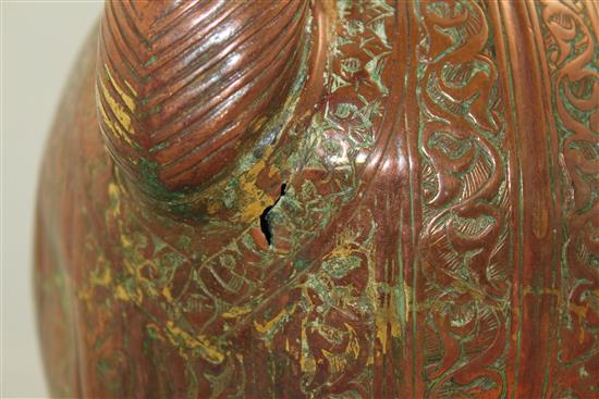 A 17th century safavid copper ewer, 13.5in.